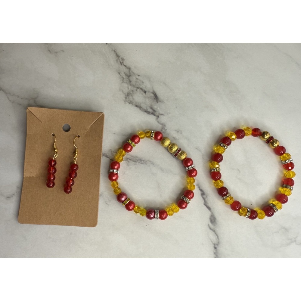 handmade beaded dangle earrings‎ and bracelets yellow and red tones